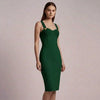 Woman wearing a green  NORVANE Riviera Bandage Dress against a plain background